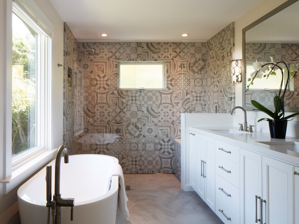 Bathroom - mid-sized transitional master multicolored tile and ceramic tile limestone floor and white floor bathroom idea in San Francisco with recessed-panel cabinets, white cabinets, an undermount sink, white countertops, white walls and quartzite countertops