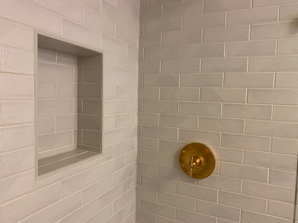 This is an example of a medium sized scandi shower room bathroom in San Diego with flat-panel cabinets, medium wood cabinets, an alcove shower, a one-piece toilet, grey tiles, ceramic tiles, white walls, ceramic flooring, a submerged sink, quartz worktops, grey floors, a hinged door, white worktops, a wall niche, a single sink and a freestanding vanity unit.