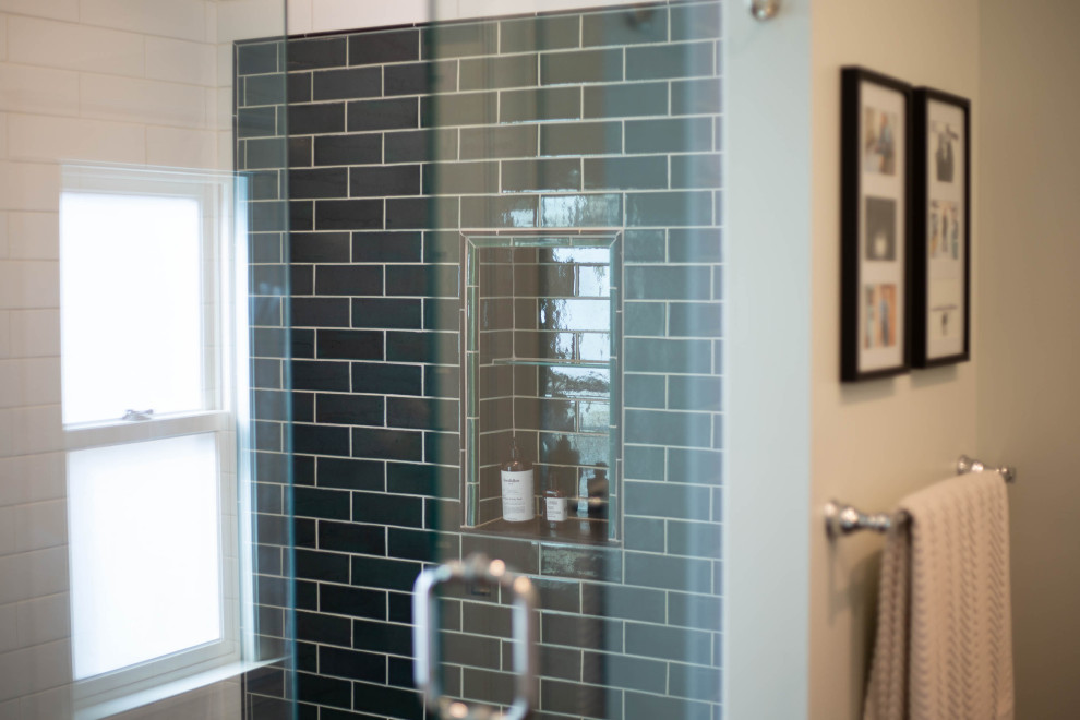 Inspiration for a small scandinavian master green tile and ceramic tile ceramic tile and black floor doorless shower remodel in Minneapolis with beaded inset cabinets, medium tone wood cabinets, white walls, a drop-in sink, onyx countertops, a hinged shower door and white countertops