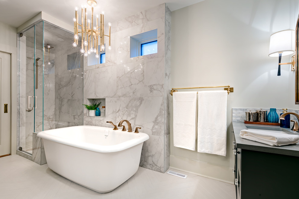 Inspiration for a contemporary master porcelain tile freestanding bathtub remodel in Calgary with flat-panel cabinets, gray cabinets, gray walls, an undermount sink and quartzite countertops