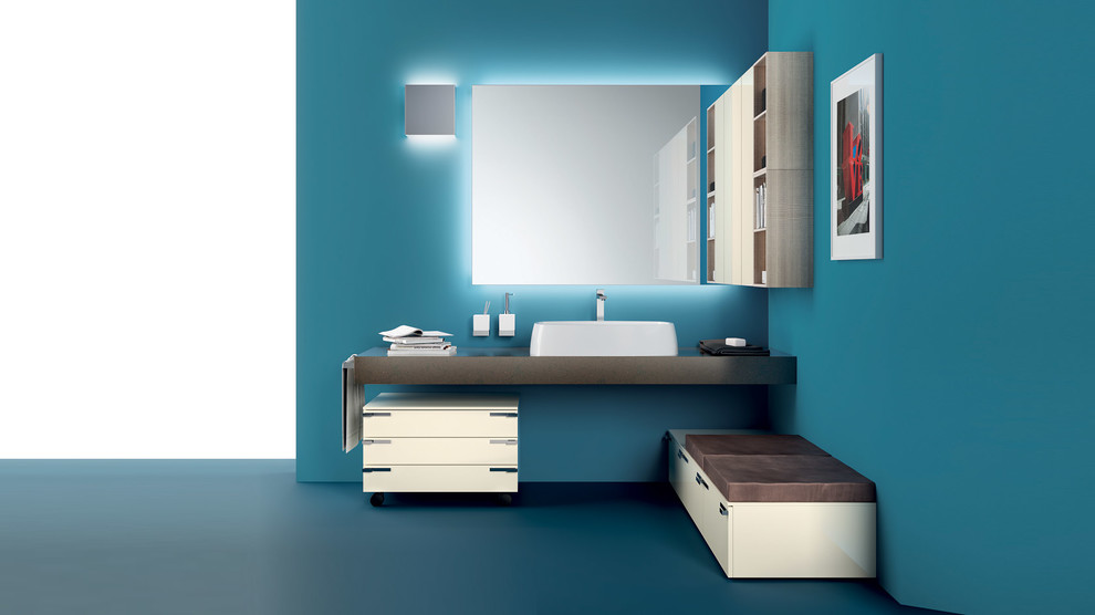 Ejemplo de cuarto de baño contemporáneo de tamaño medio con paredes azules, lavabo encastrado y suelo azul