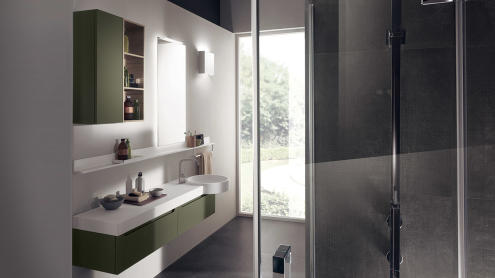 Ispirazione per una piccola stanza da bagno moderna con ante lisce, ante verdi, pareti beige e pavimento in linoleum