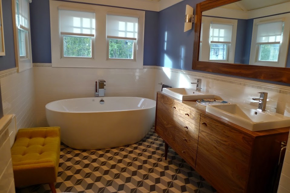 Inspiration for a large 1950s master white tile and subway tile cement tile floor and multicolored floor bathroom remodel in New York with a vessel sink, a one-piece toilet, flat-panel cabinets, medium tone wood cabinets, blue walls and wood countertops