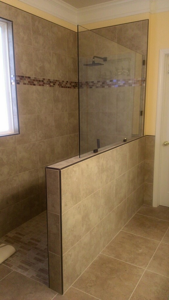 Example of a small minimalist master brown tile and porcelain tile porcelain tile walk-in shower design in Atlanta with an undermount sink, granite countertops, a two-piece toilet and yellow walls