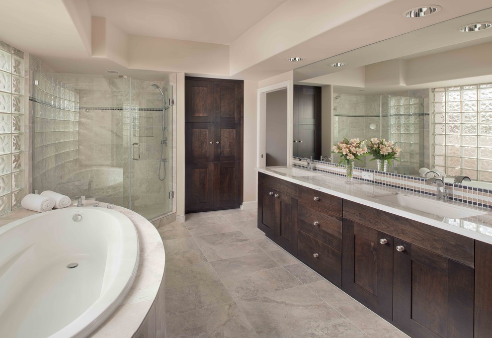 Bathroom - contemporary master beige tile, gray tile and mosaic tile ceramic tile and beige floor bathroom idea in Phoenix with shaker cabinets, dark wood cabinets, a two-piece toilet, beige walls, an undermount sink, quartzite countertops and a hinged shower door