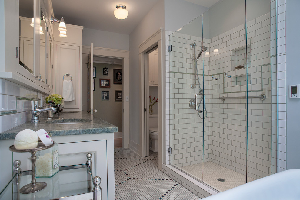 Example of a mid-sized arts and crafts master white tile and subway tile mosaic tile floor bathroom design in Portland with an undermount sink, shaker cabinets, white cabinets, granite countertops, gray walls and a two-piece toilet