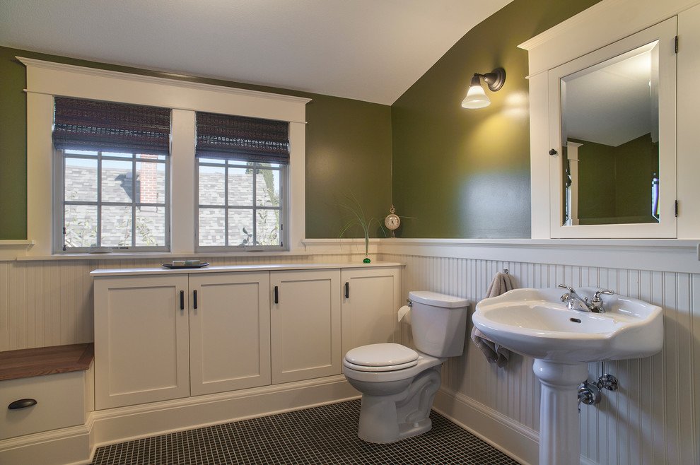 Medium sized traditional family bathroom in Portland with a pedestal sink, shaker cabinets, white cabinets, a two-piece toilet, green walls, mosaic tile flooring and engineered stone worktops.