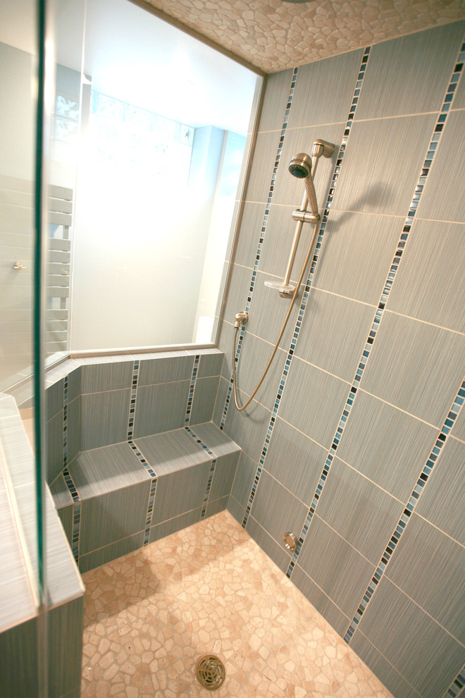 Large modern ensuite bathroom in Other with a built-in shower, grey tiles, ceramic tiles, ceramic flooring, beige floors and a hinged door.