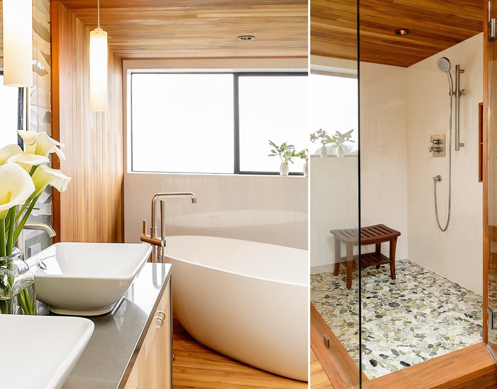 Large contemporary ensuite bathroom in San Francisco with a vessel sink, flat-panel cabinets, light wood cabinets, quartz worktops, a freestanding bath, a corner shower, a one-piece toilet, blue tiles, stone tiles, blue walls and slate flooring.
