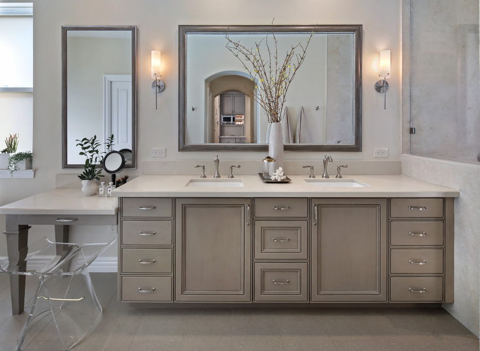This is an example of a medium sized traditional ensuite bathroom in Orange County with beige walls, beige floors, beaded cabinets, beige cabinets, a corner shower, beige tiles, porcelain tiles, porcelain flooring, a submerged sink, engineered stone worktops, an open shower and a freestanding bath.