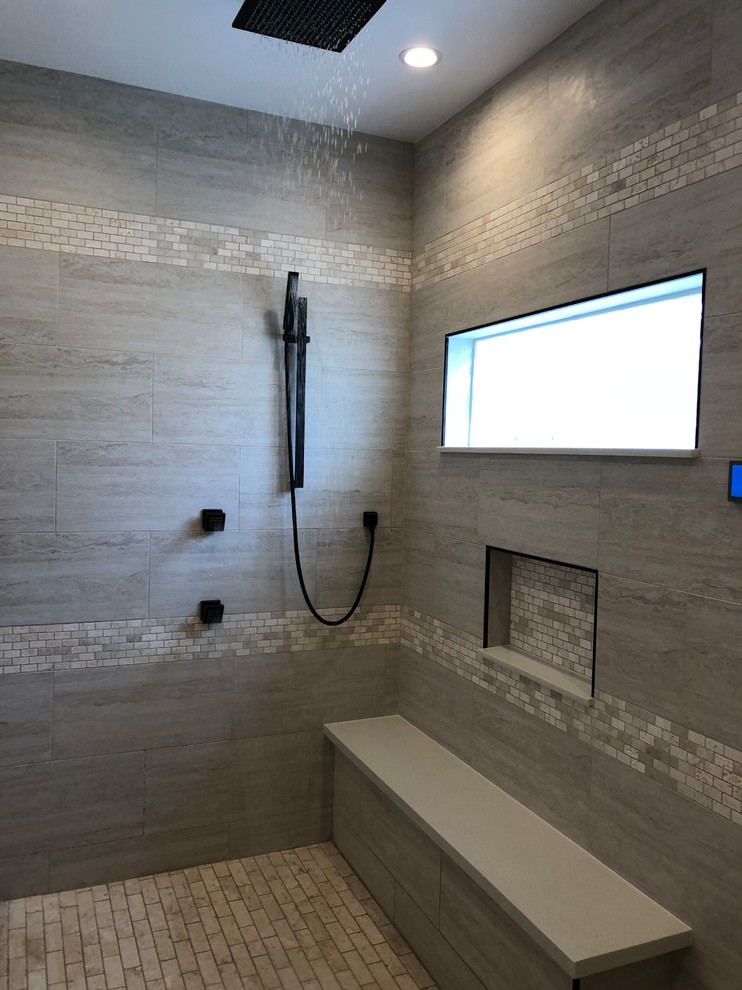 Bathroom - modern master gray tile and stone slab limestone floor and beige floor bathroom idea in Houston with recessed-panel cabinets, white cabinets, gray walls, an undermount sink, solid surface countertops and white countertops