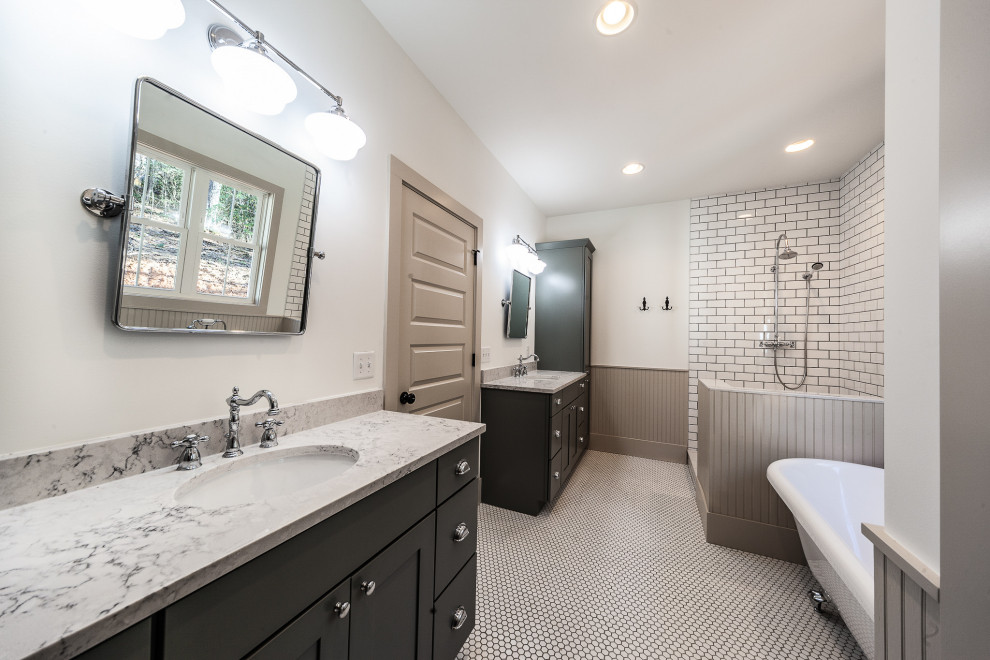 Example of a large cottage master white tile and subway tile porcelain tile and white floor bathroom design in Other with shaker cabinets, black cabinets, gray walls, an undermount sink, granite countertops and gray countertops