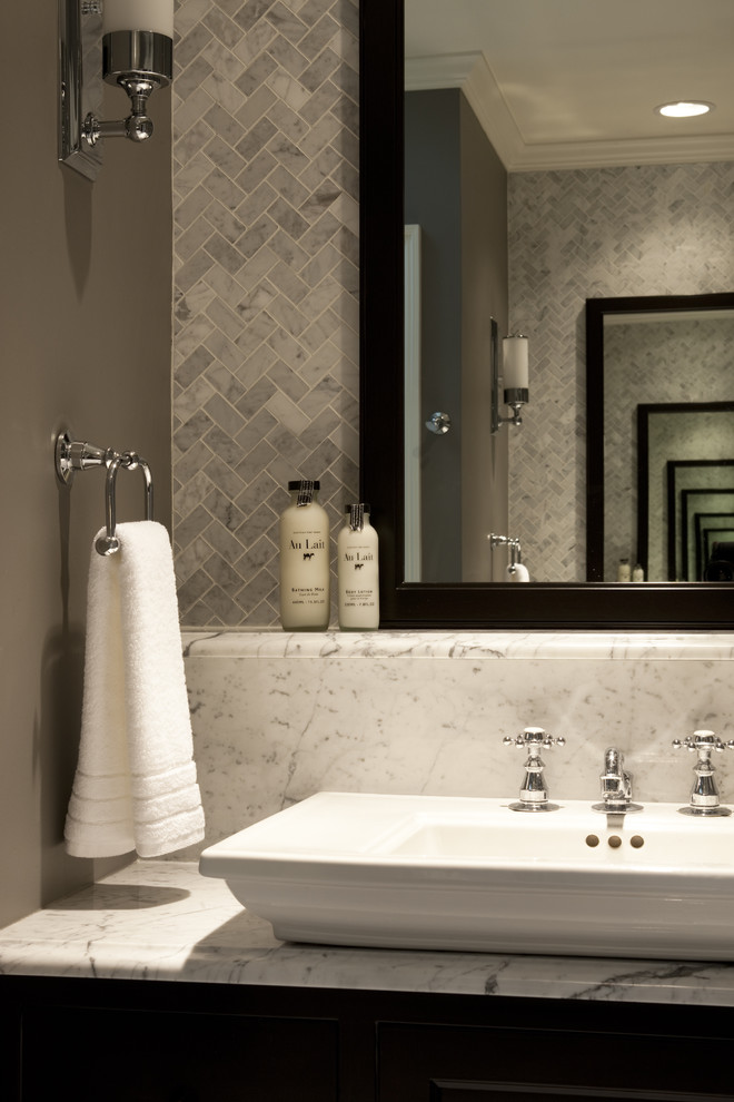 Inspiration for a timeless marble tile bathroom remodel in Chicago with marble countertops