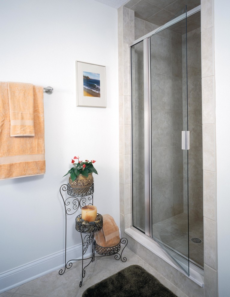 Inspiration for a medium sized contemporary shower room bathroom in Richmond with an alcove shower, grey tiles, porcelain tiles, white walls, porcelain flooring, grey floors and a hinged door.