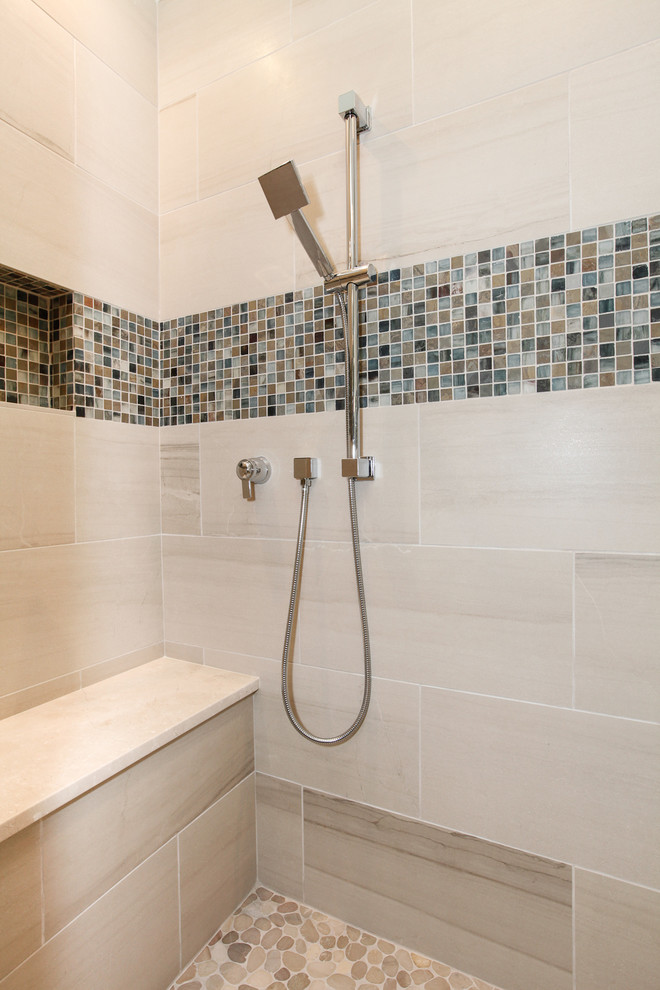 Mid-sized beach style 3/4 gray tile and porcelain tile porcelain tile and gray floor alcove shower photo in Chicago with shaker cabinets, medium tone wood cabinets, a two-piece toilet, gray walls, an undermount sink, quartz countertops and a hinged shower door