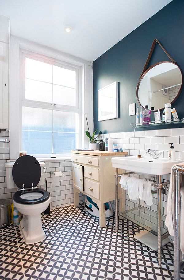 Design ideas for a medium sized contemporary bathroom in London with a one-piece toilet, white tiles, metro tiles and blue walls.