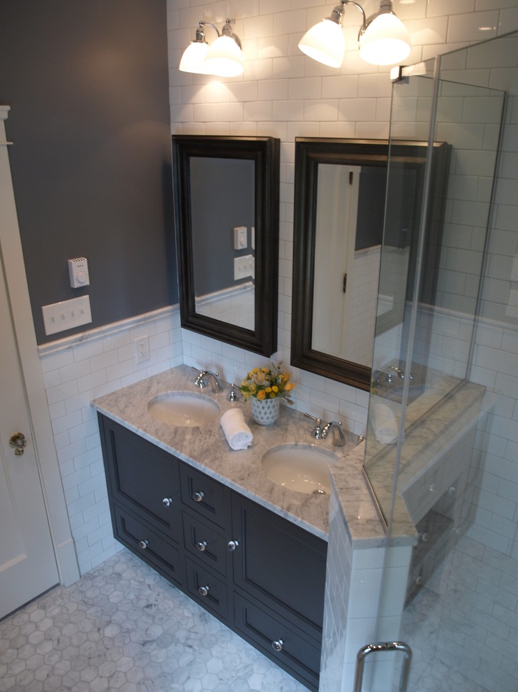 Photo of a medium sized traditional ensuite bathroom in Cleveland with a submerged sink, shaker cabinets, grey cabinets, marble worktops, a built-in shower, a two-piece toilet, white tiles, metro tiles, purple walls and marble flooring.