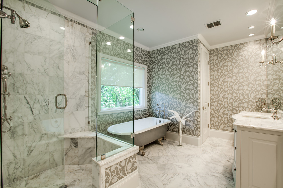 Traditional bathroom in Dallas with a claw-foot bath, a corner shower, multi-coloured walls and marble flooring.