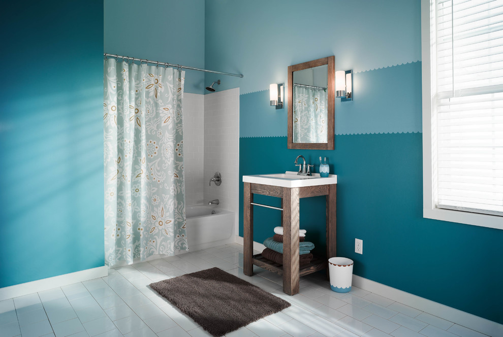 Contemporary bathroom in Cleveland with blue walls and ceramic flooring.