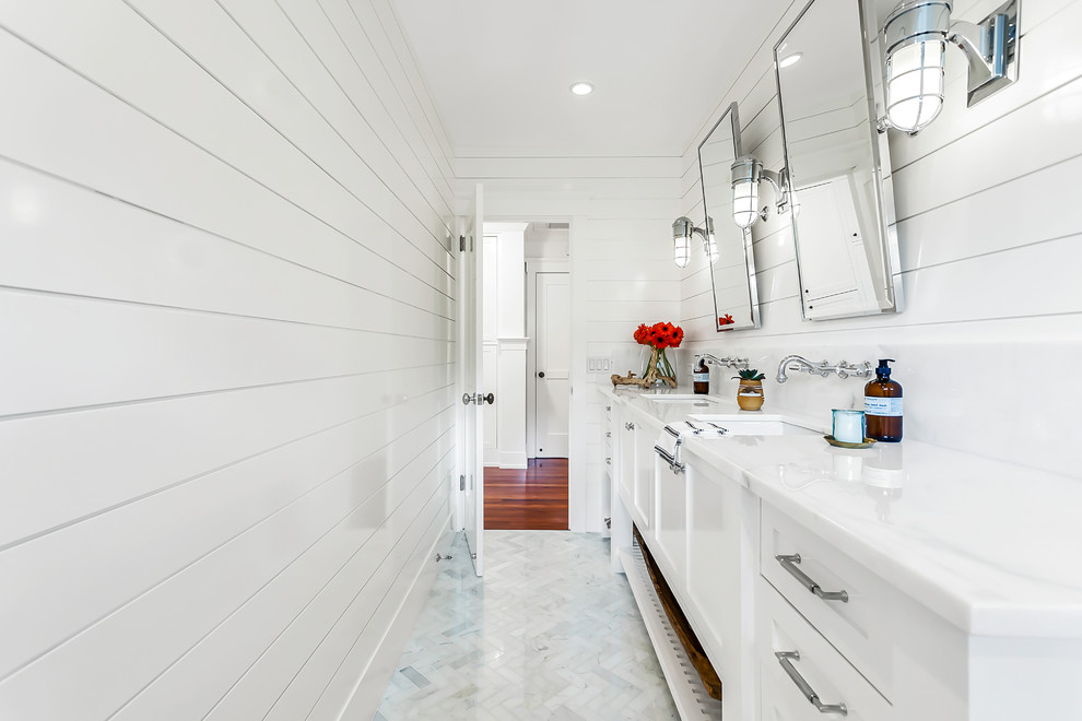 Medium sized contemporary ensuite wet room bathroom in Los Angeles with shaker cabinets, white cabinets, a one-piece toilet, white tiles, ceramic tiles, white walls, mosaic tile flooring, a submerged sink, engineered stone worktops, a hinged door and white worktops.