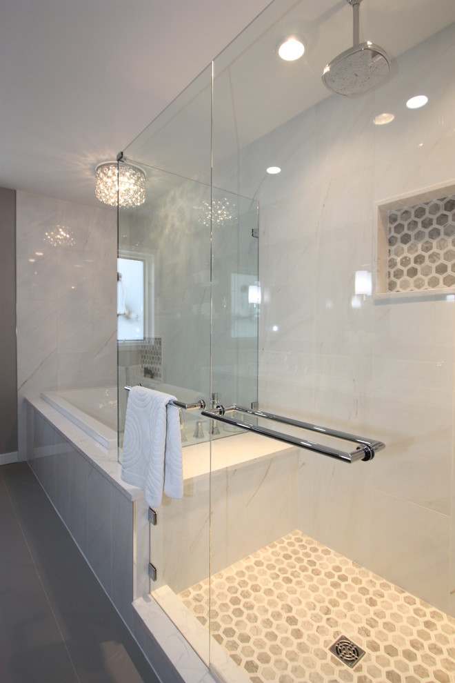 Medium sized classic ensuite bathroom in Vancouver with a submerged sink, shaker cabinets, medium wood cabinets, engineered stone worktops, a built-in bath, a corner shower, a two-piece toilet, white tiles, porcelain tiles, grey walls and porcelain flooring.
