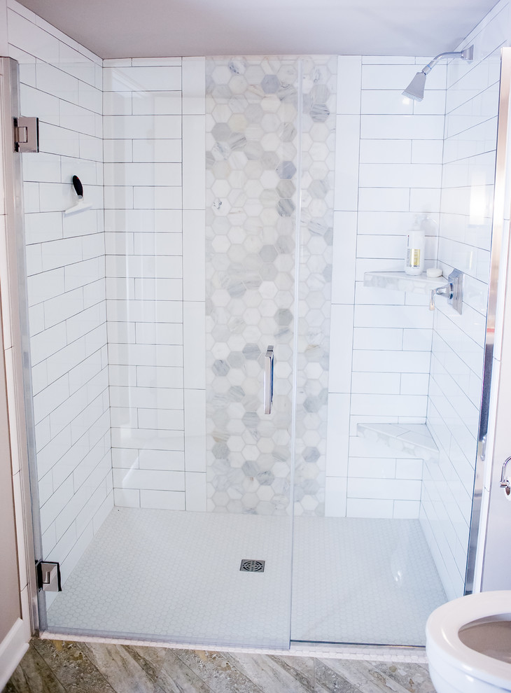 Photo of a large contemporary shower room bathroom in Other with recessed-panel cabinets, brown cabinets, a built-in shower, white tiles, grey walls, vinyl flooring and stone tiles.