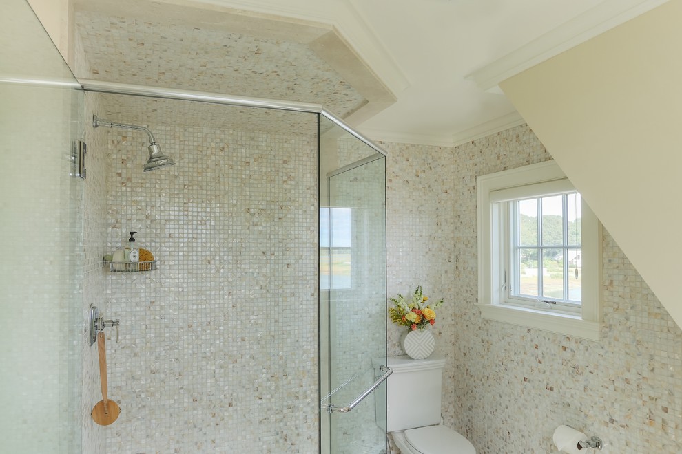 This is an example of a medium sized classic shower room bathroom in Boston with a corner shower, a two-piece toilet, multi-coloured tiles, ceramic tiles and multi-coloured walls.
