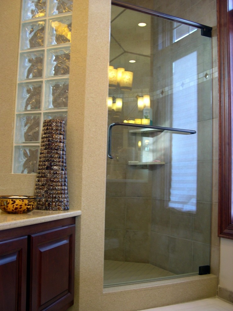 This is an example of a large classic ensuite bathroom in Minneapolis with a double shower.