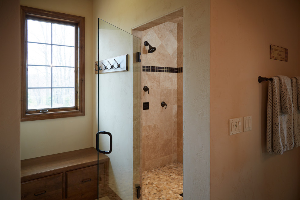 Shower featuring body sprays and a showerhead Traditional Bathroom