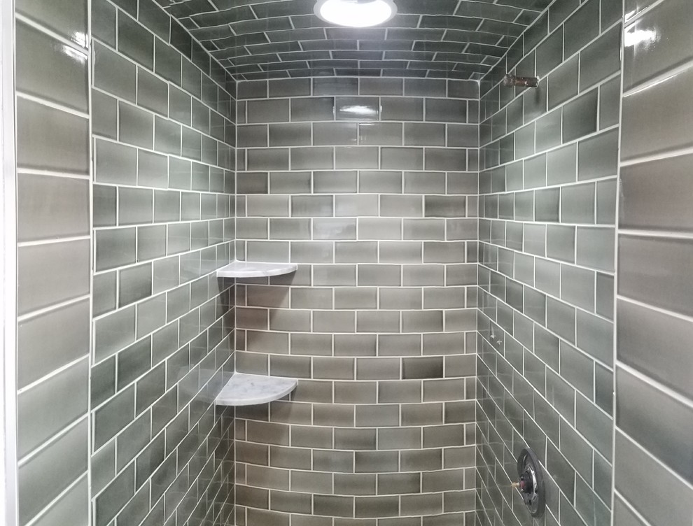 This is an example of a large traditional ensuite bathroom in Boston with an alcove shower, green tiles, ceramic tiles, green walls, marble flooring, white floors and an open shower.
