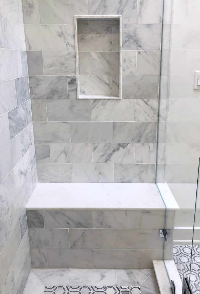Example of a large trendy master gray tile and marble tile mosaic tile floor and gray floor doorless shower design in New York with white walls, marble countertops, a hinged shower door and white countertops