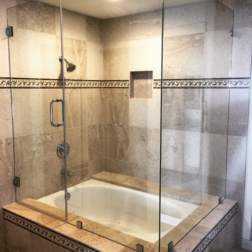Example of a mid-sized classic master beige tile and stone tile travertine floor doorless shower design in Orange County with a hot tub