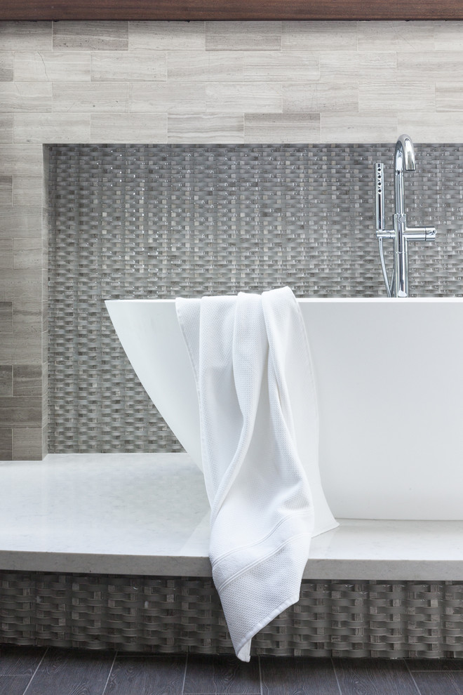 Example of a large transitional freestanding bathtub design in Sacramento