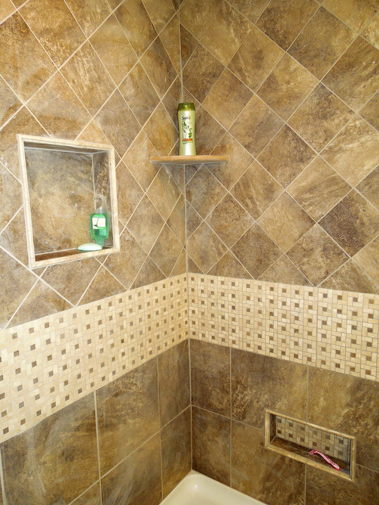 Mid-sized elegant 3/4 brown tile and porcelain tile porcelain tile alcove shower photo in Charleston with an undermount sink, recessed-panel cabinets, granite countertops, a two-piece toilet and yellow walls