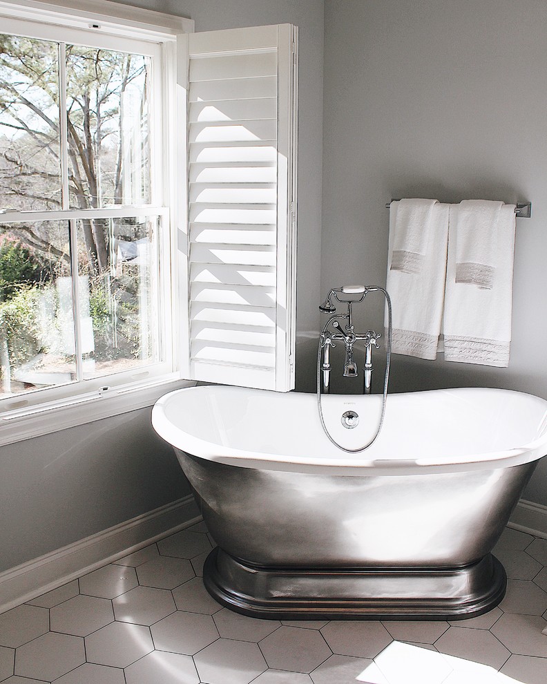 Freestanding bathtub - cottage white floor freestanding bathtub idea in Atlanta