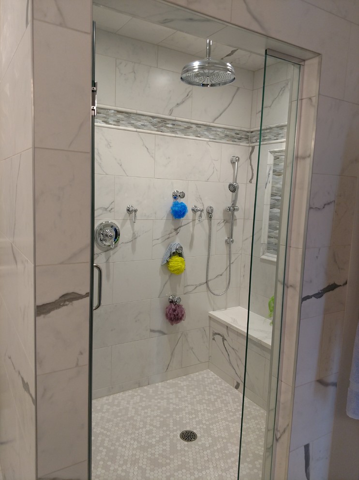 Example of a large classic master white tile and marble tile marble floor and white floor bathroom design in Chicago with shaker cabinets, white cabinets, a one-piece toilet, gray walls, an undermount sink, marble countertops, a hinged shower door and white countertops