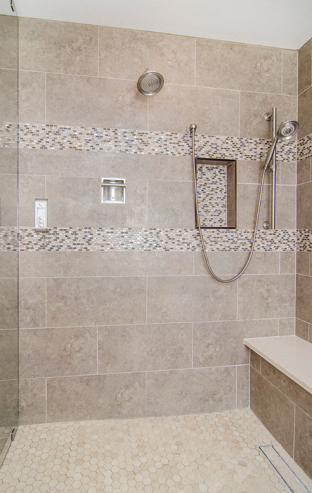 Example of a mid-sized transitional master brown tile and ceramic tile ceramic tile bathroom design in Dallas with an undermount sink, shaker cabinets, dark wood cabinets, solid surface countertops, a one-piece toilet and beige walls