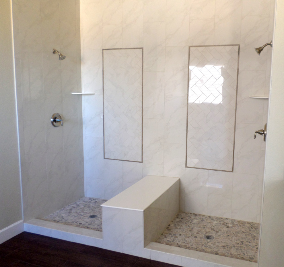 Medium sized traditional ensuite bathroom in Denver with shaker cabinets, white cabinets, a double shower, white tiles, porcelain tiles, beige walls, porcelain flooring, engineered stone worktops, brown floors, a hinged door, grey worktops and double sinks.