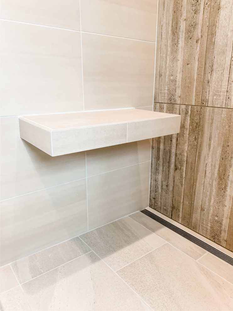 Bathroom - small craftsman 3/4 beige tile and porcelain tile porcelain tile and beige floor bathroom idea in San Francisco with furniture-like cabinets, medium tone wood cabinets, a one-piece toilet, white walls, an undermount sink, quartz countertops and brown countertops