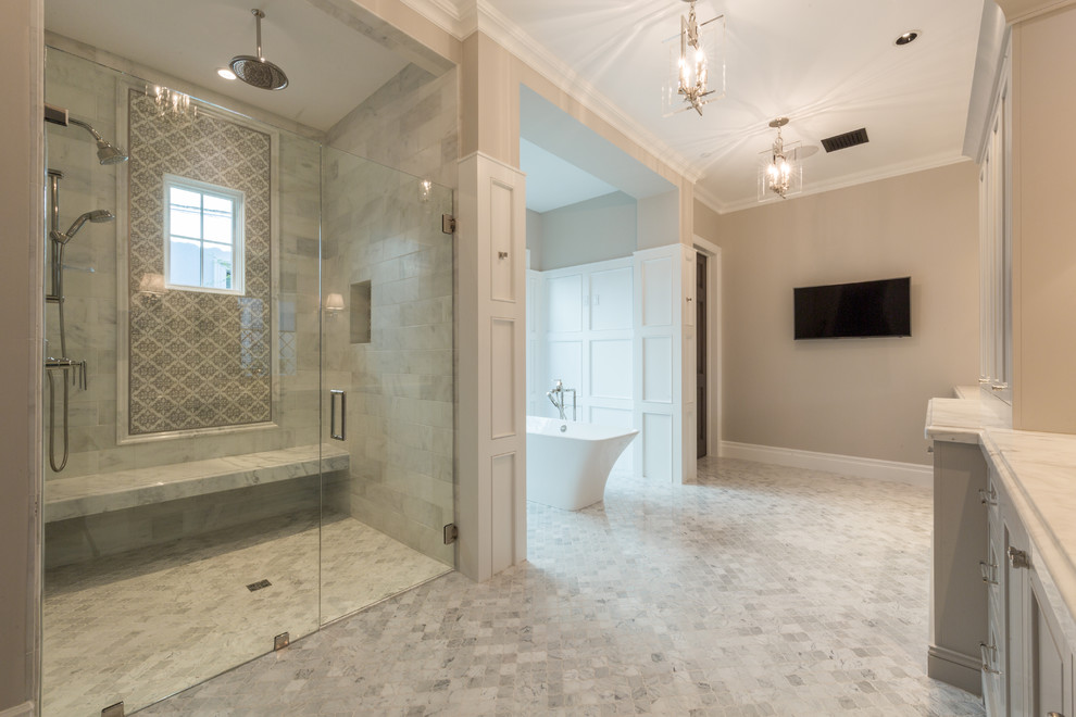 Design ideas for a large classic ensuite bathroom in Phoenix with grey cabinets, a freestanding bath, an alcove shower, grey tiles, marble tiles, beige walls, marble flooring, marble worktops, grey floors, a hinged door and grey worktops.