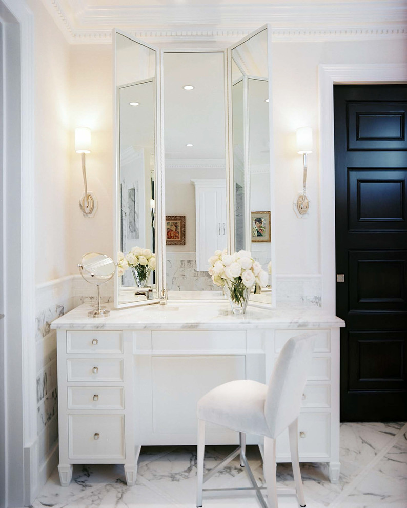 Inspiration for a large timeless master white tile and stone slab marble floor bathroom remodel in Miami with raised-panel cabinets, white cabinets, marble countertops and white walls