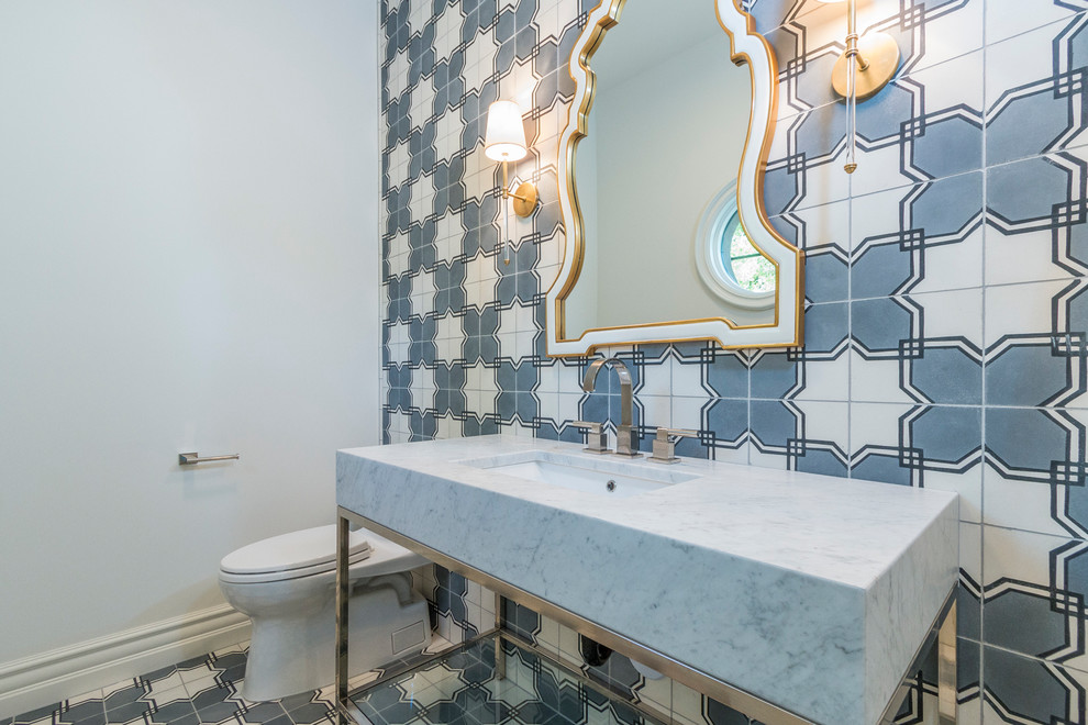 Photo of an expansive classic shower room bathroom in Phoenix with a one-piece toilet, black and white tiles, cement tiles, grey walls, cement flooring, a submerged sink, marble worktops and white floors.