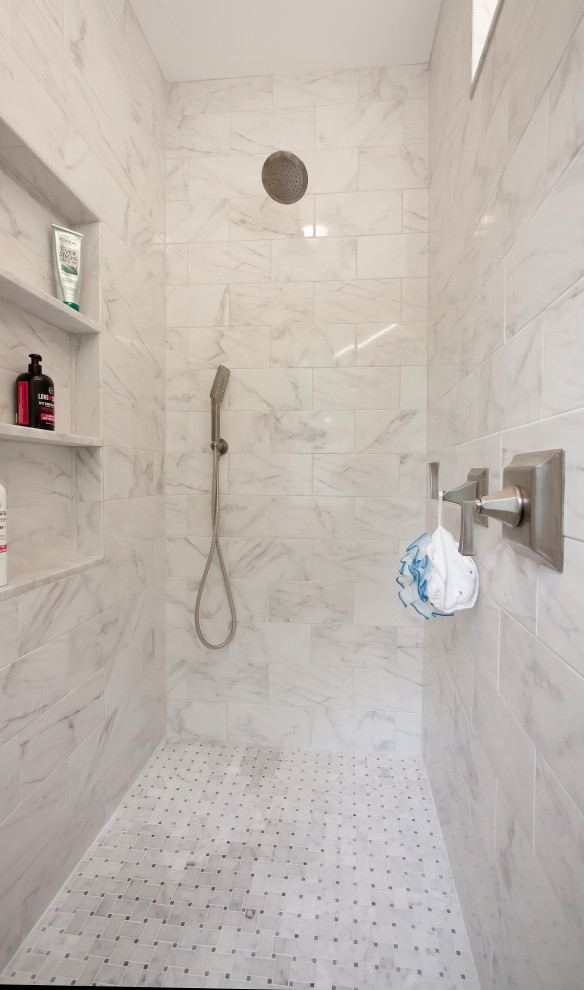 Medium sized classic ensuite bathroom in Philadelphia with shaker cabinets, grey cabinets, a two-piece toilet, white tiles, grey walls, a submerged sink, grey floors, an open shower, white worktops, a wall niche, a single sink and a freestanding vanity unit.