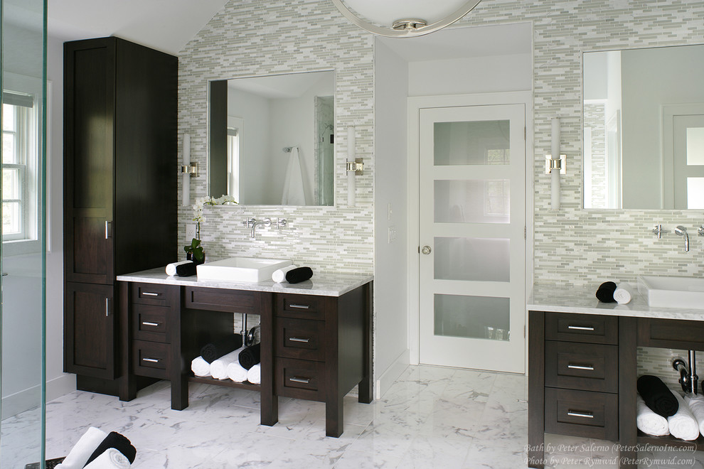 Inspiration for a large classic ensuite bathroom in New York with a vessel sink, shaker cabinets, dark wood cabinets, marble worktops, a freestanding bath, a corner shower, a two-piece toilet, white tiles, glass tiles, white walls and marble flooring.