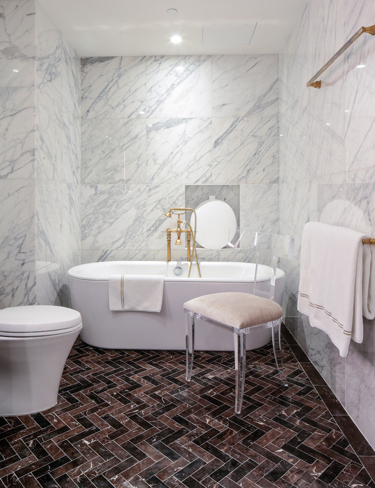 Example of a mid-sized trendy master multicolored tile and ceramic tile ceramic tile bathroom design in New York with flat-panel cabinets, dark wood cabinets, a two-piece toilet, white walls, an undermount sink and marble countertops
