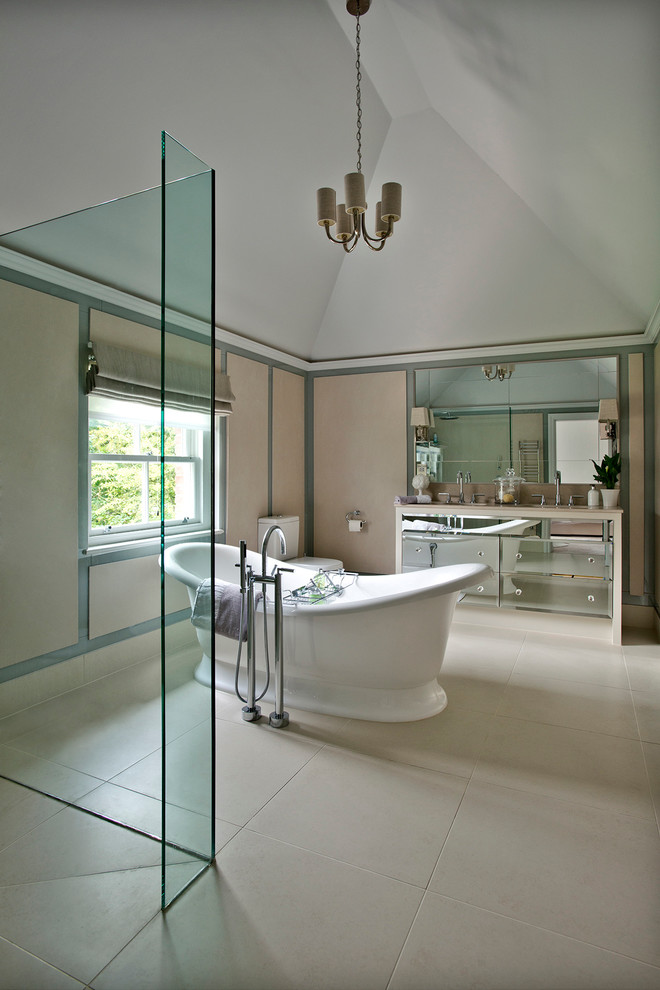 This is an example of a contemporary ensuite bathroom in Gloucestershire with an integrated sink, freestanding cabinets, a built-in shower and beige walls.