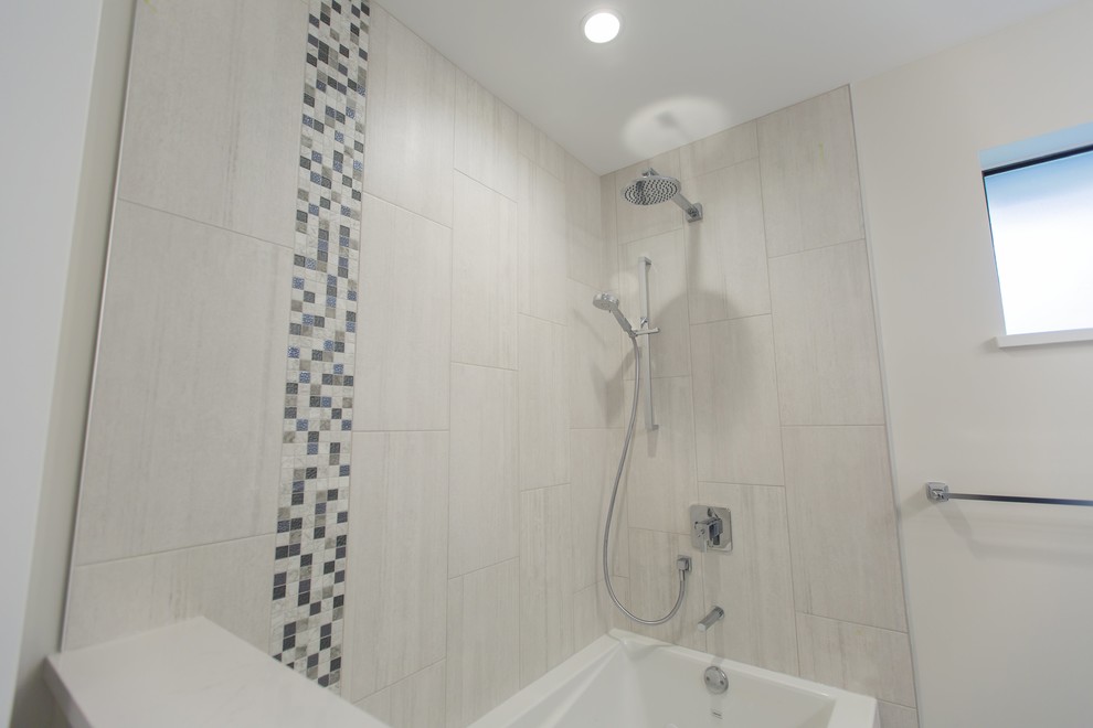 Design ideas for a medium sized modern ensuite bathroom in Vancouver with recessed-panel cabinets, grey cabinets, a built-in bath, a shower/bath combination, a one-piece toilet, white tiles, mosaic tiles, white walls, laminate floors, an integrated sink, marble worktops, white floors and a shower curtain.
