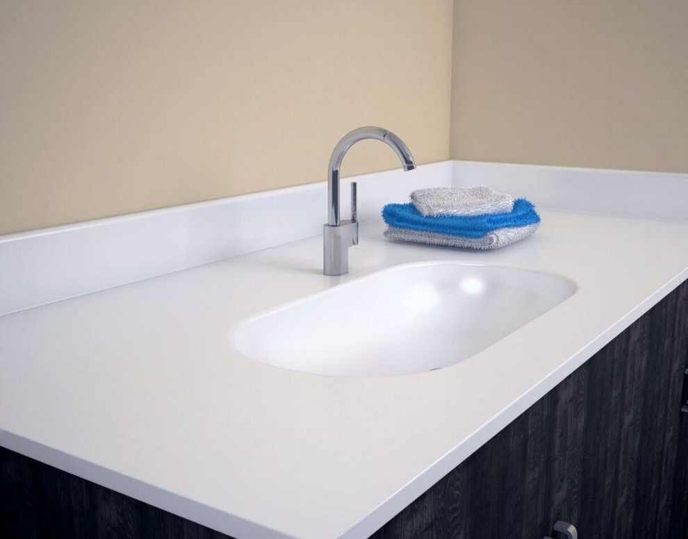 Esempio di una stanza da bagno moderna con top in superficie solida