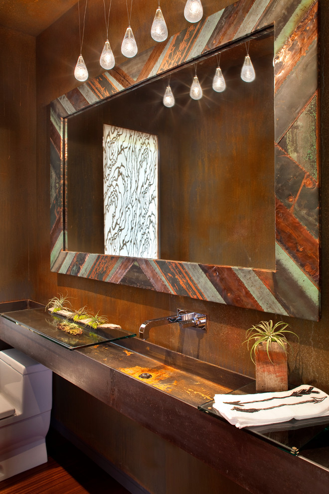 Mountain style bathroom photo in Other with a wall-mount sink and a one-piece toilet