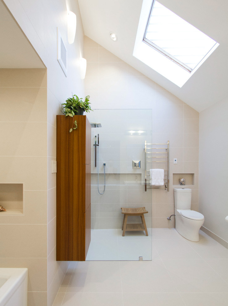Large contemporary ensuite bathroom in Philadelphia with flat-panel cabinets, brown cabinets, a built-in bath, an alcove shower, a two-piece toilet, beige tiles, porcelain tiles, beige walls, porcelain flooring, an integrated sink, engineered stone worktops, beige floors, an open shower and white worktops.